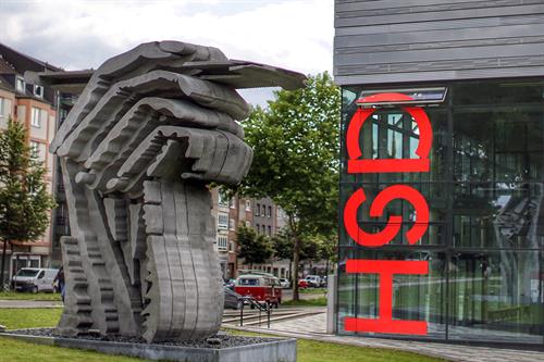 Sculpture Hand at the Pencil by Klaus Kammerichs